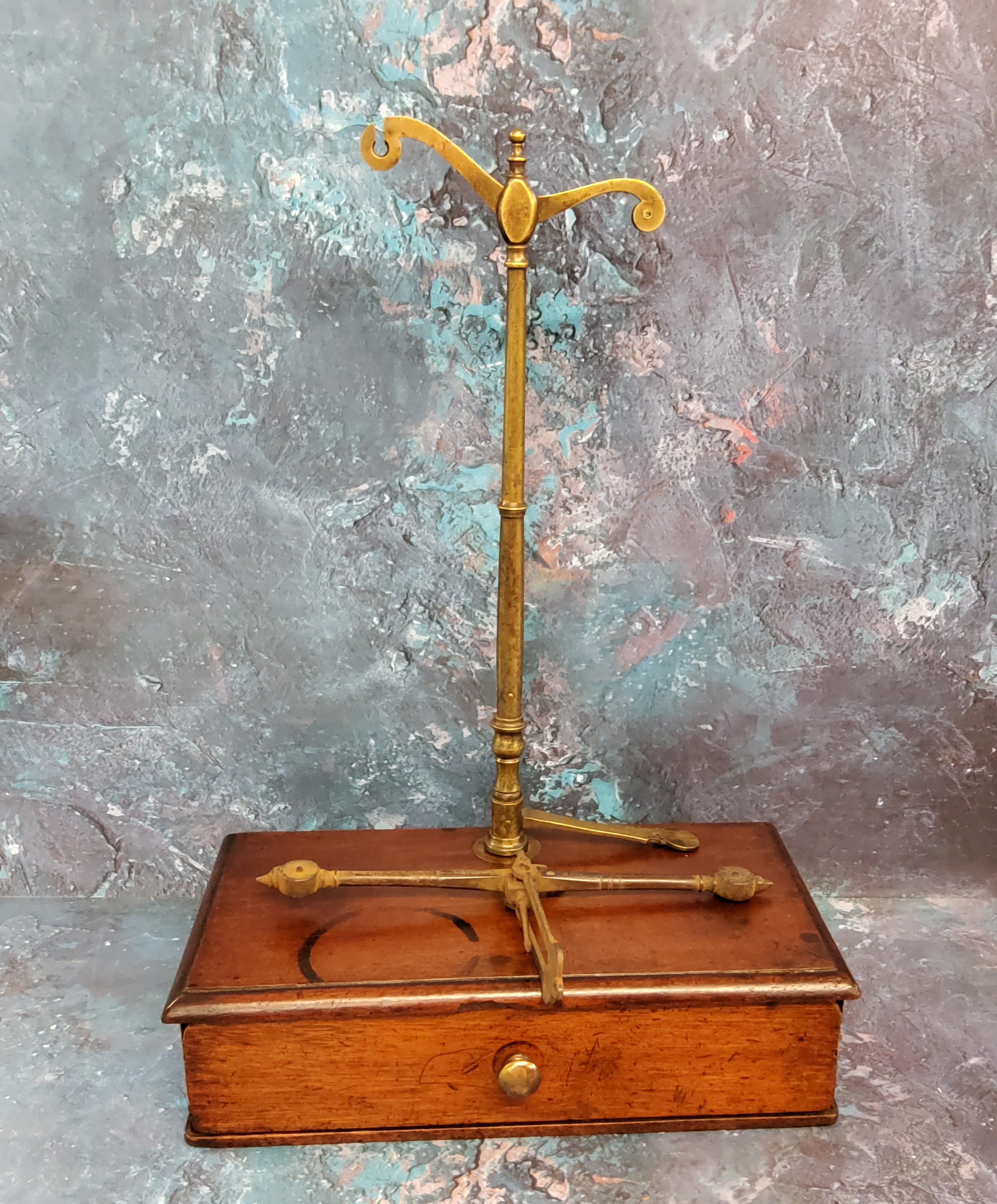 A set of 19th century  brass beam balance scales, mahogany stand, with drawer, 25cm wide, 14cm dee