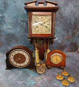 An oak 30 hour mantel clock, by Smiths, Arabic numerals, 20cm high, c.1930;   a Garrad oak mantel