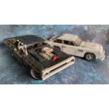 A Mould King Lego style Fast & Furious Dodge Charger, built; a James Bond 007 Aston Martin DB5,