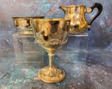 A silver plated goblet, Garrard & Co, Ltd. applied with anthemion and scrolls, 15cm high, 4004;