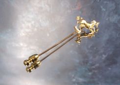 A 9ct gold stick pin, the finial as a rampant horse, JS, Sheffield 1.58g (VAT on Hammer price)
