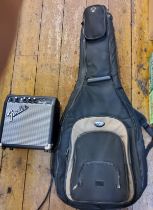 A Fender Frontman 10G amp;  a CNB guitar case (2)