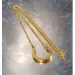 A 9ct gold horseshoe pendant necklace, JS, Sheffield, 7.91g (VAT on Hammer price)