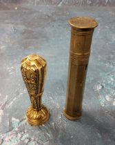 A French gilt metal seal, of typical form, 7cm high;  another, base metal double ended, 9cm long (2)