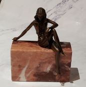 Art Deco style, gilt bronze, of an elegant lady, seated on  marble, 14cm high