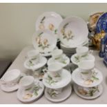 A German Hutschenreuther Victoria dinner and tea service, for twelve, each printed with magnolia