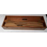 J Halden & Co Ltd - a set of pearwood draught's man curves, rectangular mahogany box