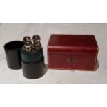 A 20th century three bottle cylindrical travelling cologne case, plated mounts, 13.5cm high;  an