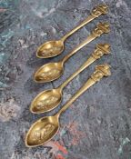 Rolex - four silver-plated Bucherer teaspoons, the shaped handle terminating with the Rolex Crown