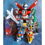 A Lego 21311 Voltron, built complete with six instruction manuals