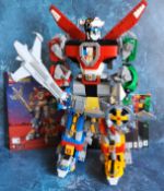 A Lego 21311 Voltron, built complete with six instruction manuals