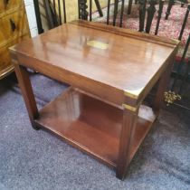 A Reproduction campaign two-tier table, vacant cartouche with brass capped angles, 57cm h x 68cm w x