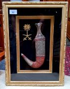 An Arab white metal janbiya, mounted in a display case, with Brunei symbol, 48cm x 32cm