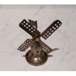 A Dutch silver coloured metal miniature windmill, 6cm high