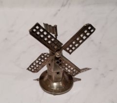 A Dutch silver coloured metal miniature windmill, 6cm high