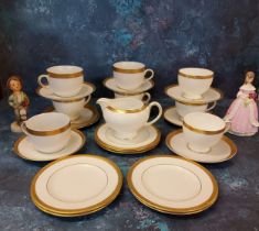 A Royal Worcester figure, Modesty, crown and circle mark;   a Wedgwood tea service, banded in