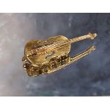 A 9ct gold novelty brooch in the form of a violin, JS, Sheffield 5.22g (VAT on Hammer price)