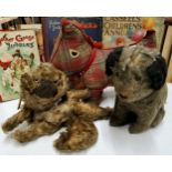 An unusual early 20th century novelty pyjamas case, as a dog, 37cm long, working zip; other dogs (3)