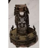 A Regency bronze cylindrical scent bottle holder, pierced and cast with urns and anthemions, 12cm