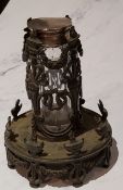 A Regency bronze cylindrical scent bottle holder, pierced and cast with urns and anthemions, 12cm