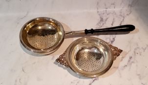 A silver tea strainer and dish, pierced foliate handle, 10.5cm wide, Elkington and Co, Sheffield