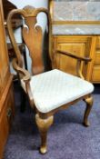 A George II Revival elbow chair