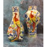 A Mason Ironstone panelled baluster bottle vase, decorated in red, yellow and blue with fanciful