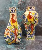 A Mason Ironstone panelled baluster bottle vase, decorated in red, yellow and blue with fanciful