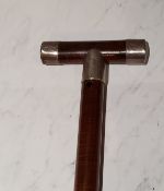 A silver mounted walking stick, T shaped handle, 82cm long,