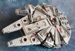 A Mould King Lego style Star Wars Millenium Falcon with stand; a Star Wars Imperial All Terrain