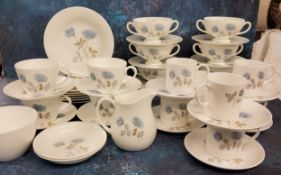 A Wedgwood Ice Rose part dinner, coffee and tea service, comprising six coffee cups and saucers,