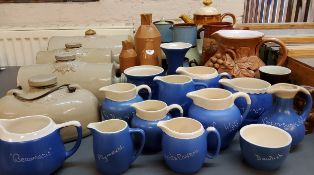 West Country Ceramics - Named jugs, on a light blue ground, each inscribed in white;  Stoneware