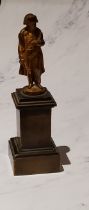 French School, 19th century, gilt and patinated bronze, Napoleon, 14cm high