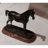 After Mene, a dark patinated bronze,  horse standing, rouge marble base, 21cm high