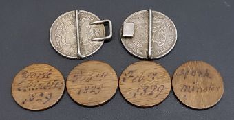 An unusual belt buckle made from a Brazil 2000 Reis 1888 and a Republic of Mexico Un Peso 1873 coin;