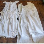 Four early 20th-century white cotton gowns