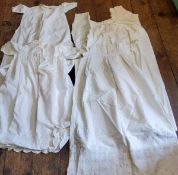 Four early 20th-century white cotton gowns
