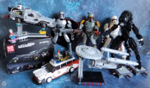 Lego style movie related kits including Ghostbusters ECTO-1; Back to the Future Part II Flying