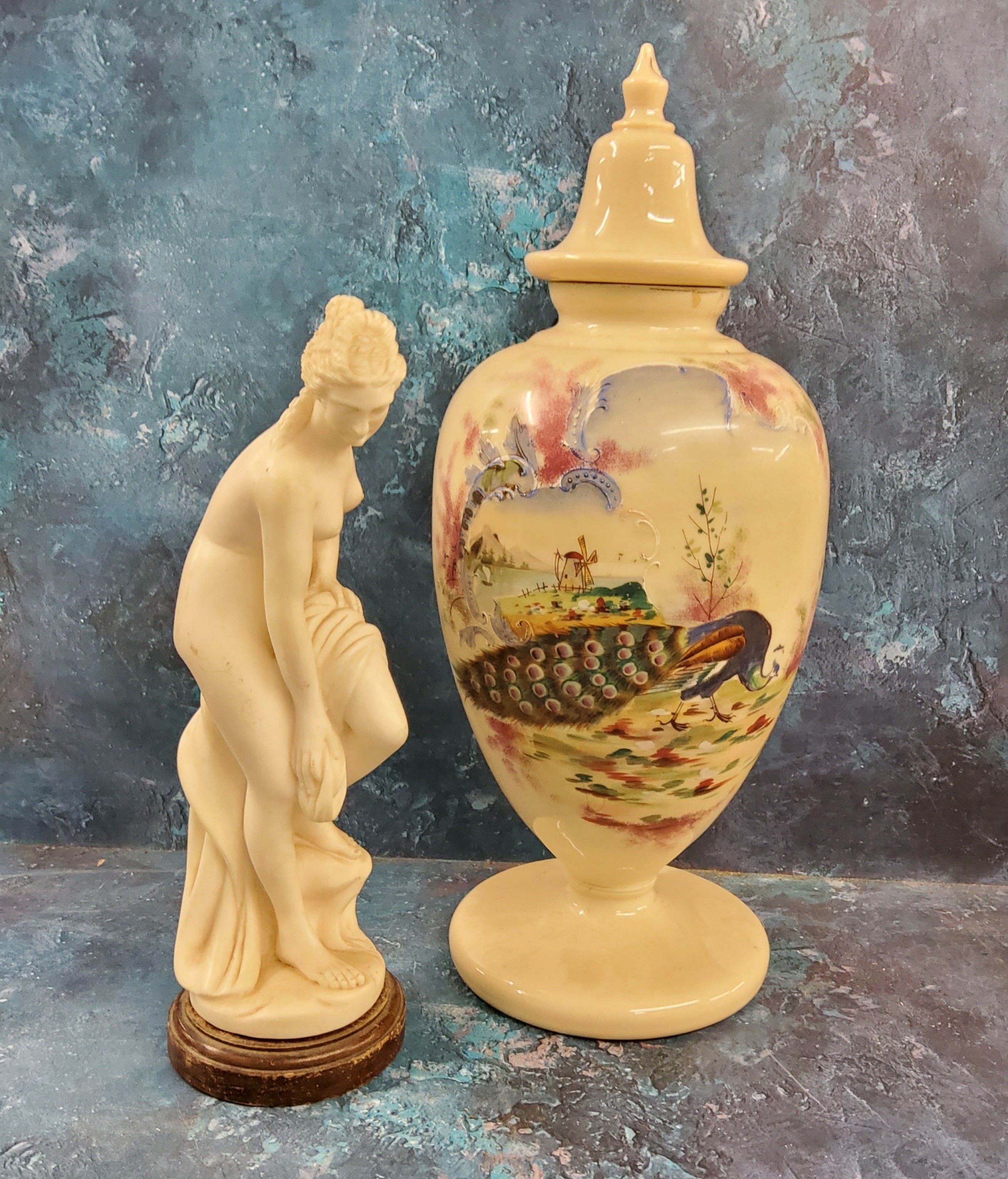 A large Victorian opaque glass vases and cover, decorated with a peacock, 50cm high, c.1880;  a