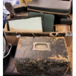 A green leather bound jewellery box, fitted interior; others; jewellery trays; an ebony hand mirror;