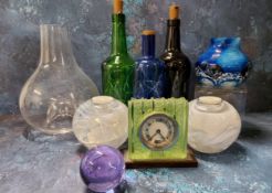 An Art Deco frosted green dressing table clock, in relief with bands of stylised flowers, Arabic