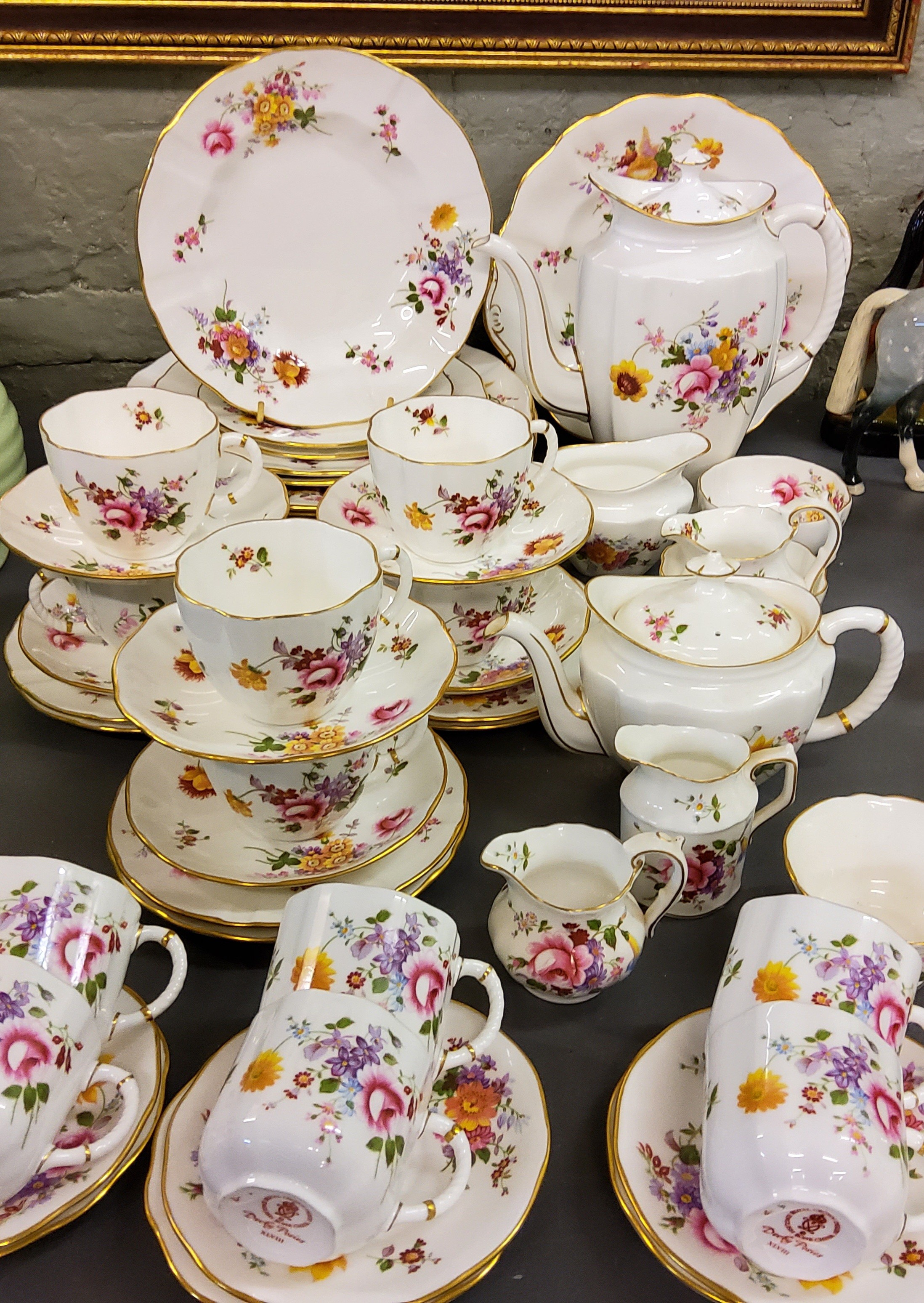 A Royal Crown Derby Posies pattern dinner, tea and coffee service, comprising six coffee cups and