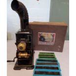 A late 19th century German small magic lantern by Ernst Plank of Bavaria, boxed;  with slides