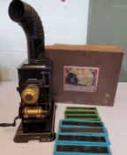 A late 19th century German small magic lantern by Ernst Plank of Bavaria, boxed;  with slides