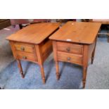 A pair of Ducal contemporary two drawer pine side tables, 58cm high, 42cm wide;  a bevelled edge
