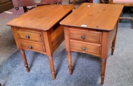 A pair of Ducal contemporary two drawer pine side tables, 58cm high, 42cm wide;  a bevelled edge