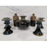 Studio Pottery - a pair of cylindrical vase, quarter ribbed, Tenmoku glaze, 15cn high;  a similar