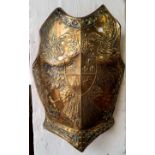 An embossed brass Toledo eagle breast plate