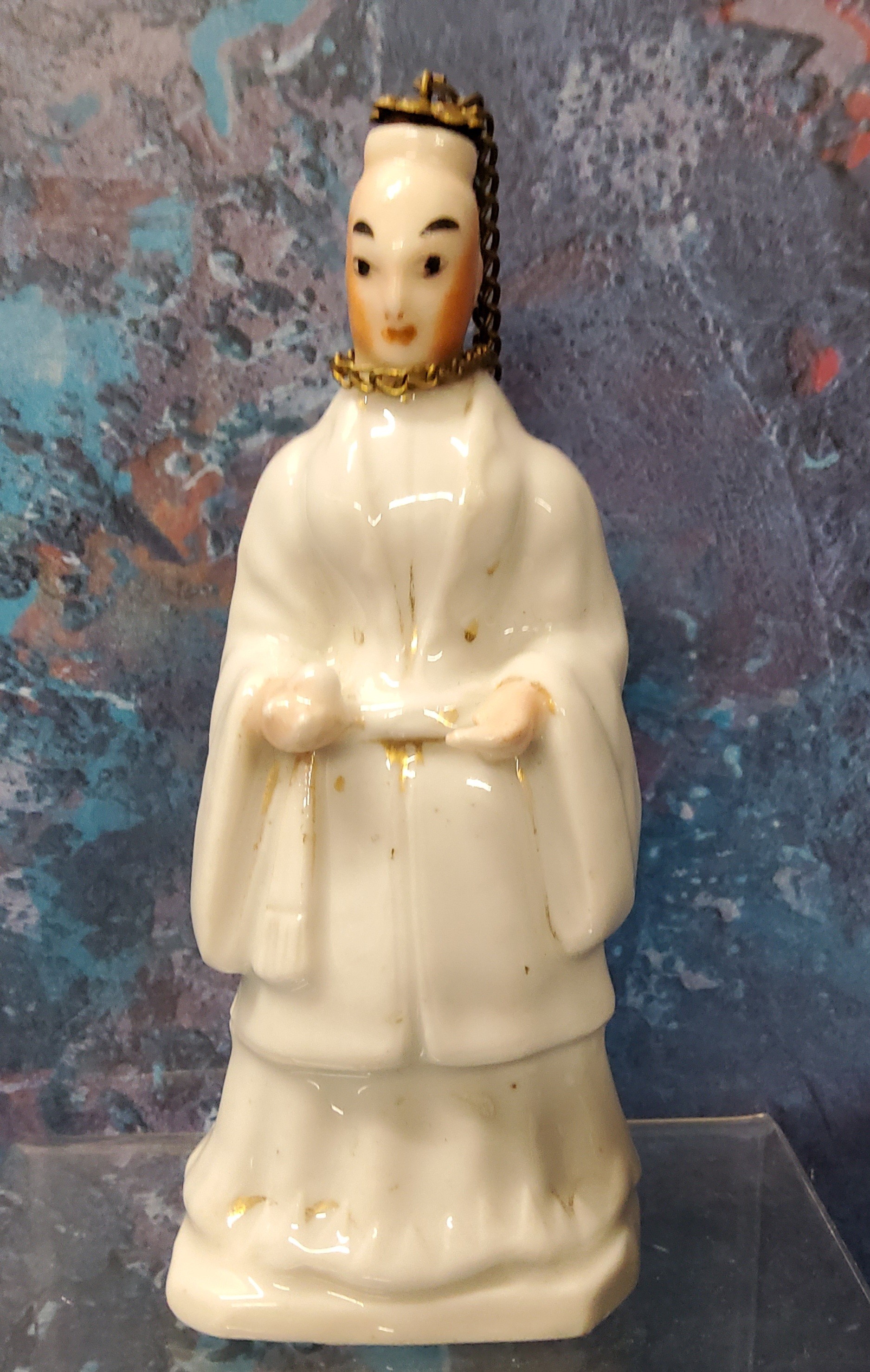 A late 19th/early 20th century Continental porcelain novelty figural scent bottle, of a Chinaman,