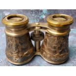 A pair of 19th century silver field glasses, the eye pieces inscribed The Jockey Club Paris,